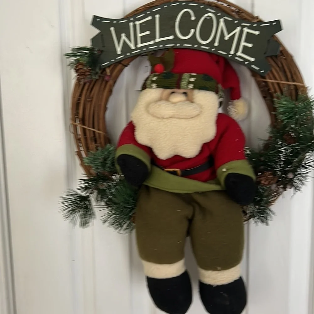 Holiday Santa Christmas wreath. Plush Santa with Pine.